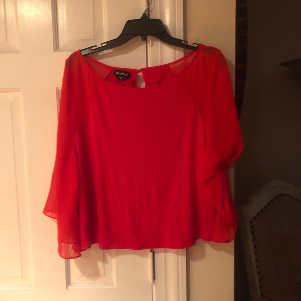 Bebe top size L.